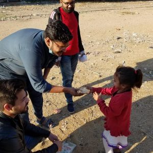 Distribution of food among the underprivileged people.